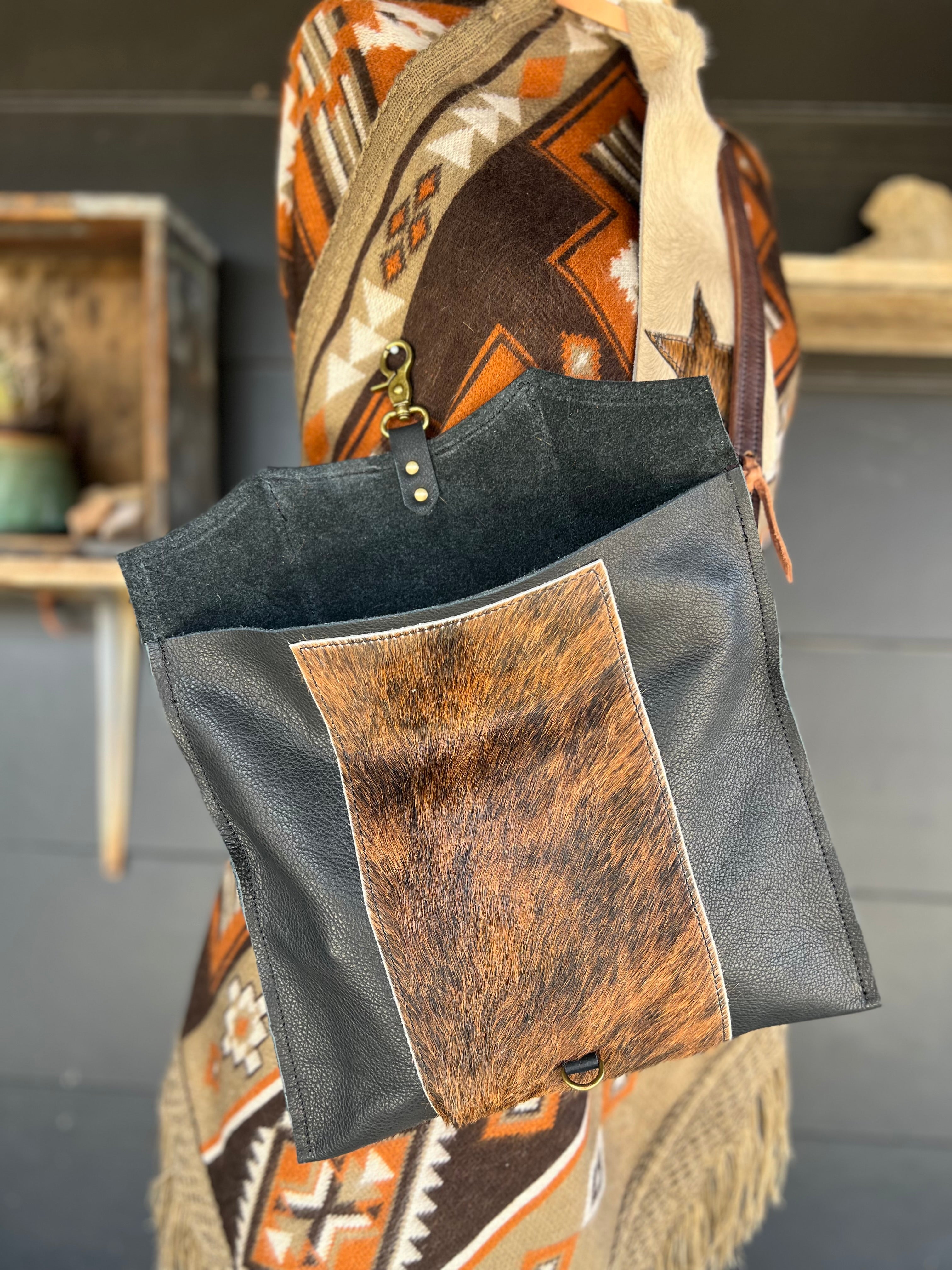 The Legacy Clutch Handbag Cowhide