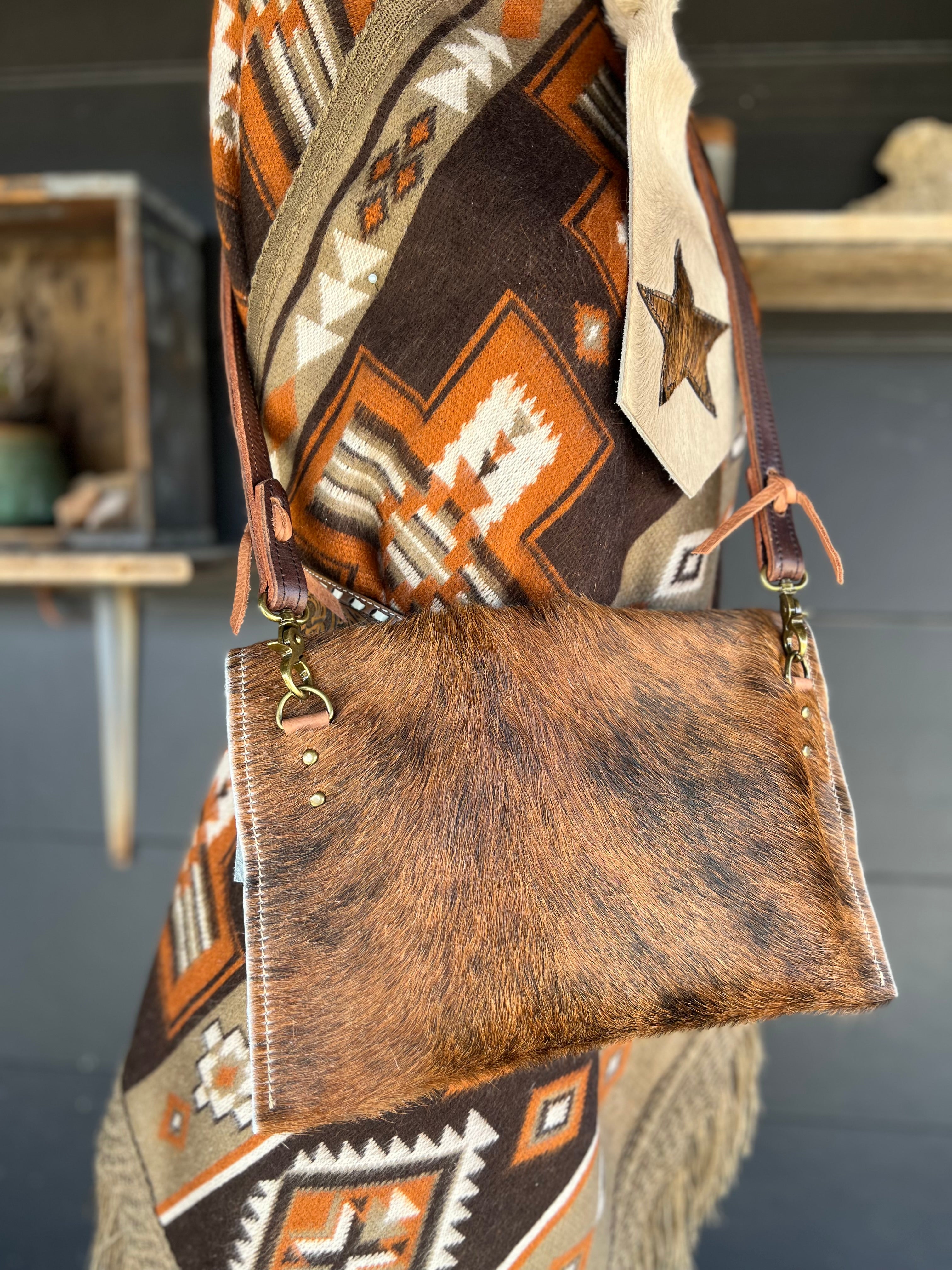 The Legacy Clutch Handbag Cowhide