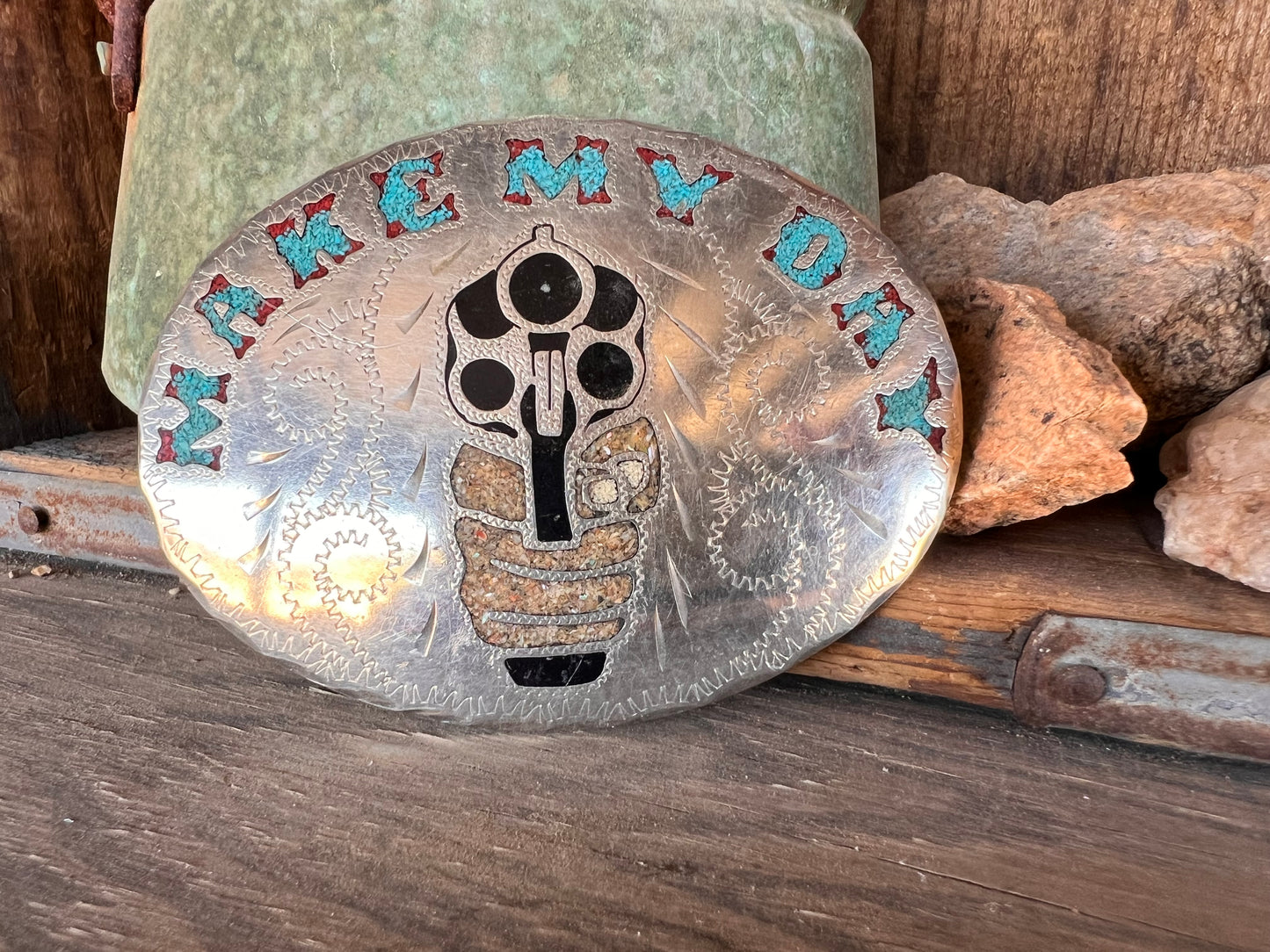 “Vintage Southwestern custom ranch buckle with turquoise inlay and outlaw pistol motif.”