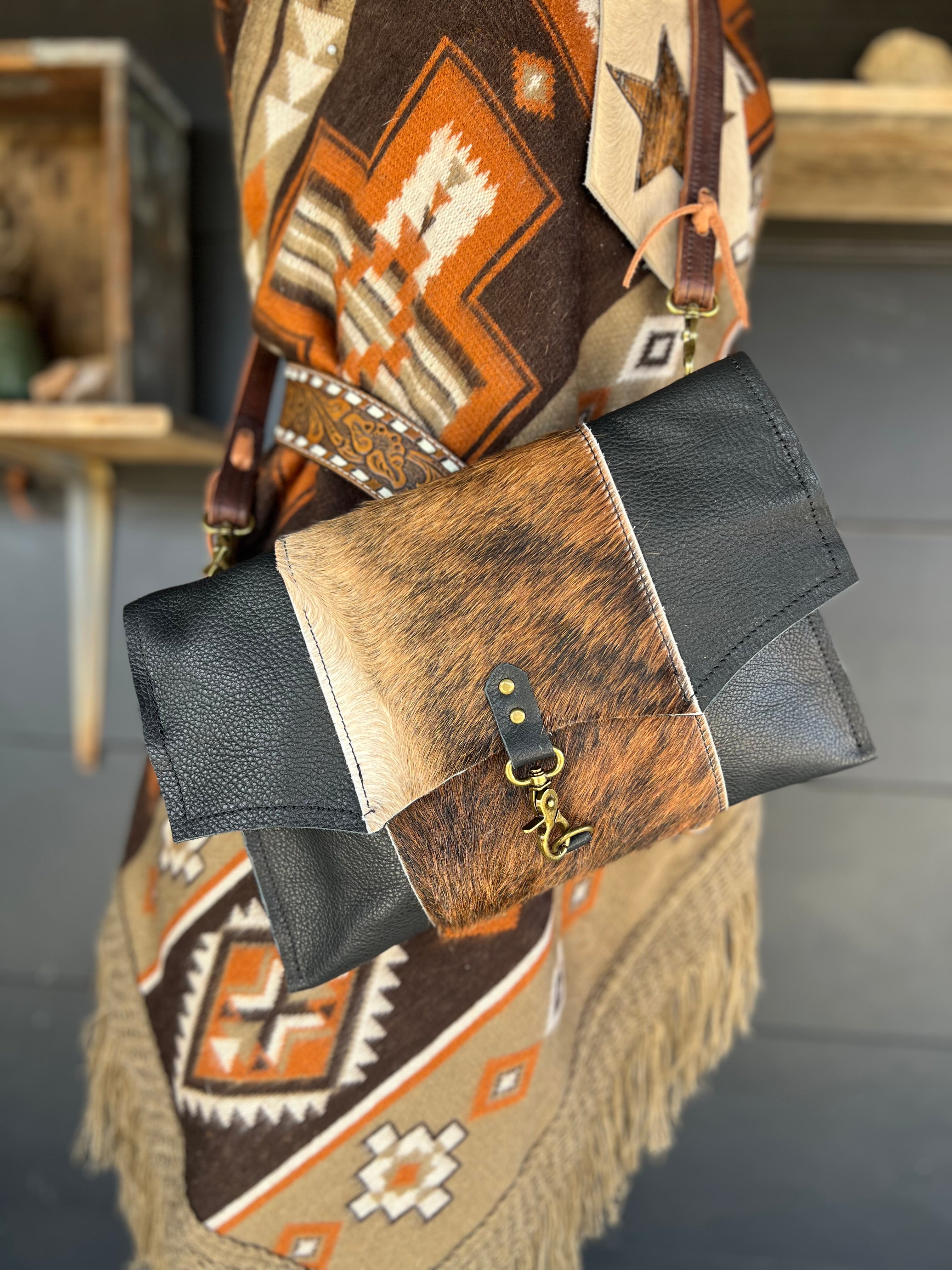 The Legacy Clutch Handbag Cowhide