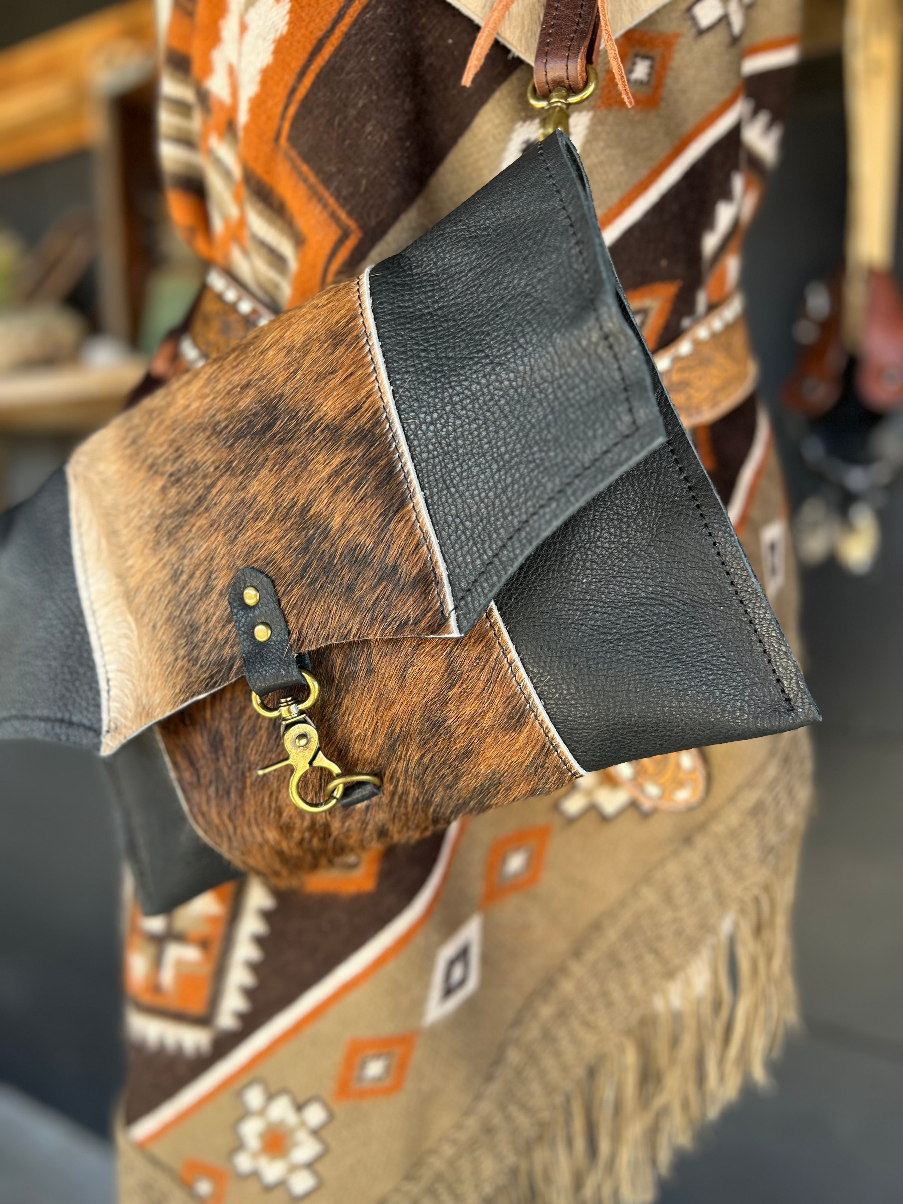 The Legacy Clutch Handbag Cowhide