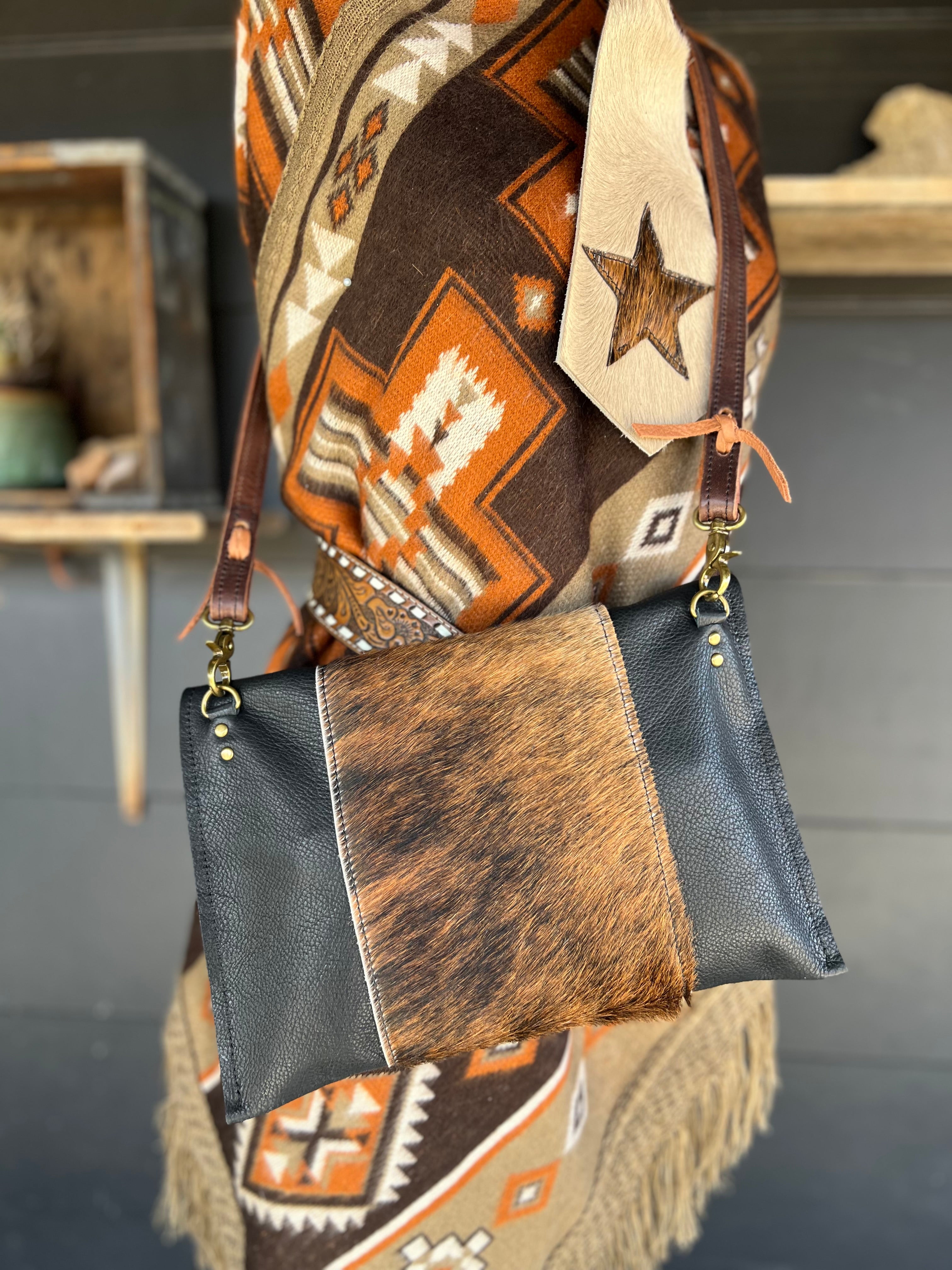 The Legacy Clutch Handbag Cowhide