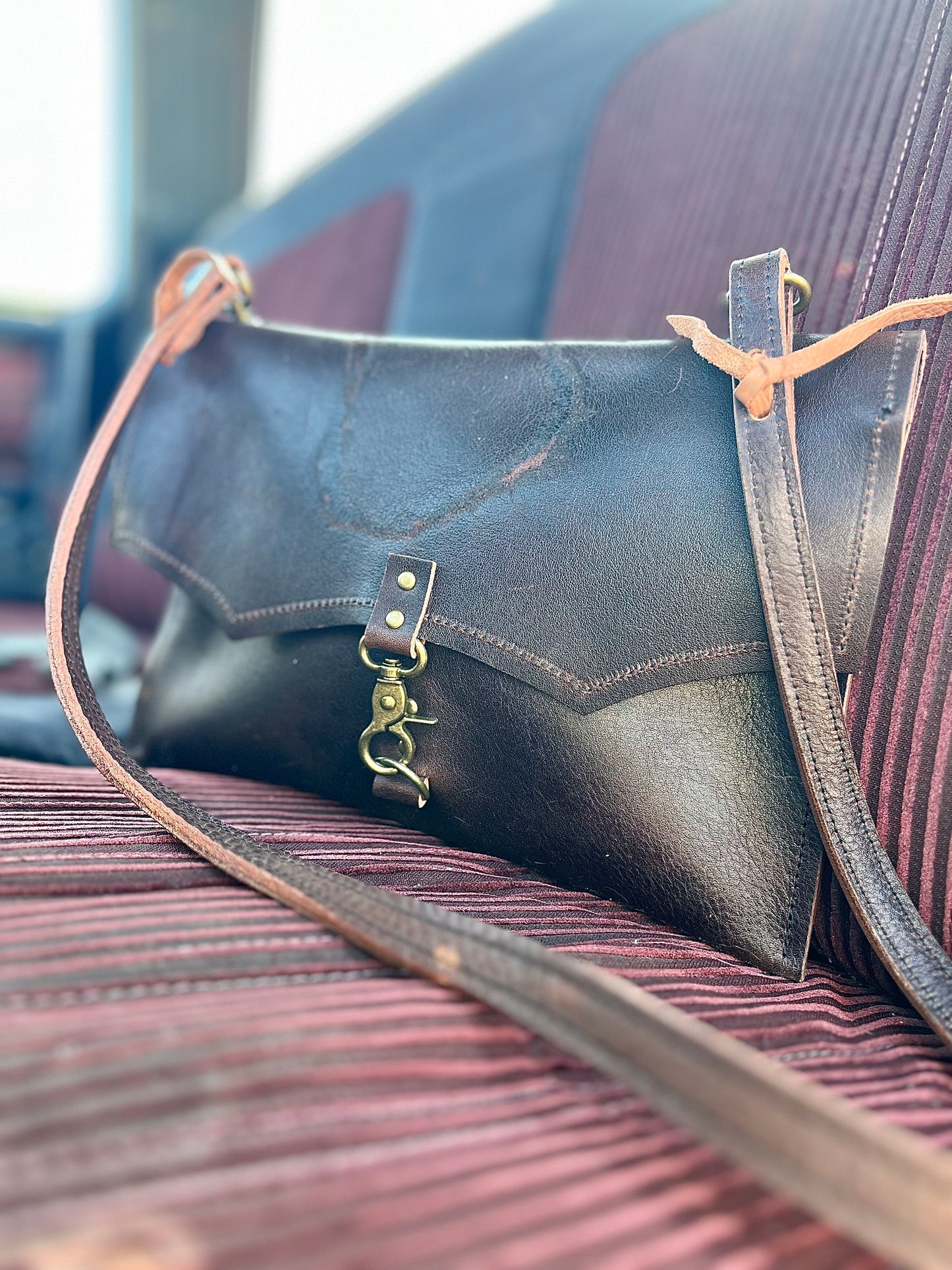 The Legacy Clutch Handbag with Heart Brand